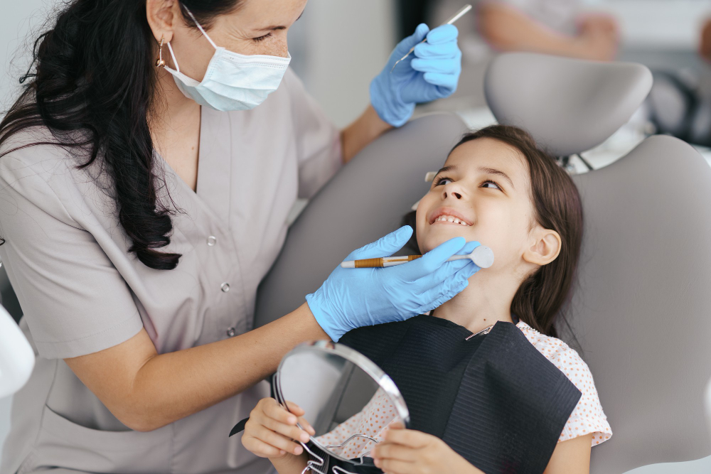 little girl dentist smiling