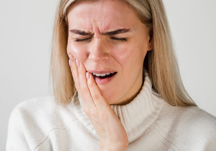 woman experiencing toothache